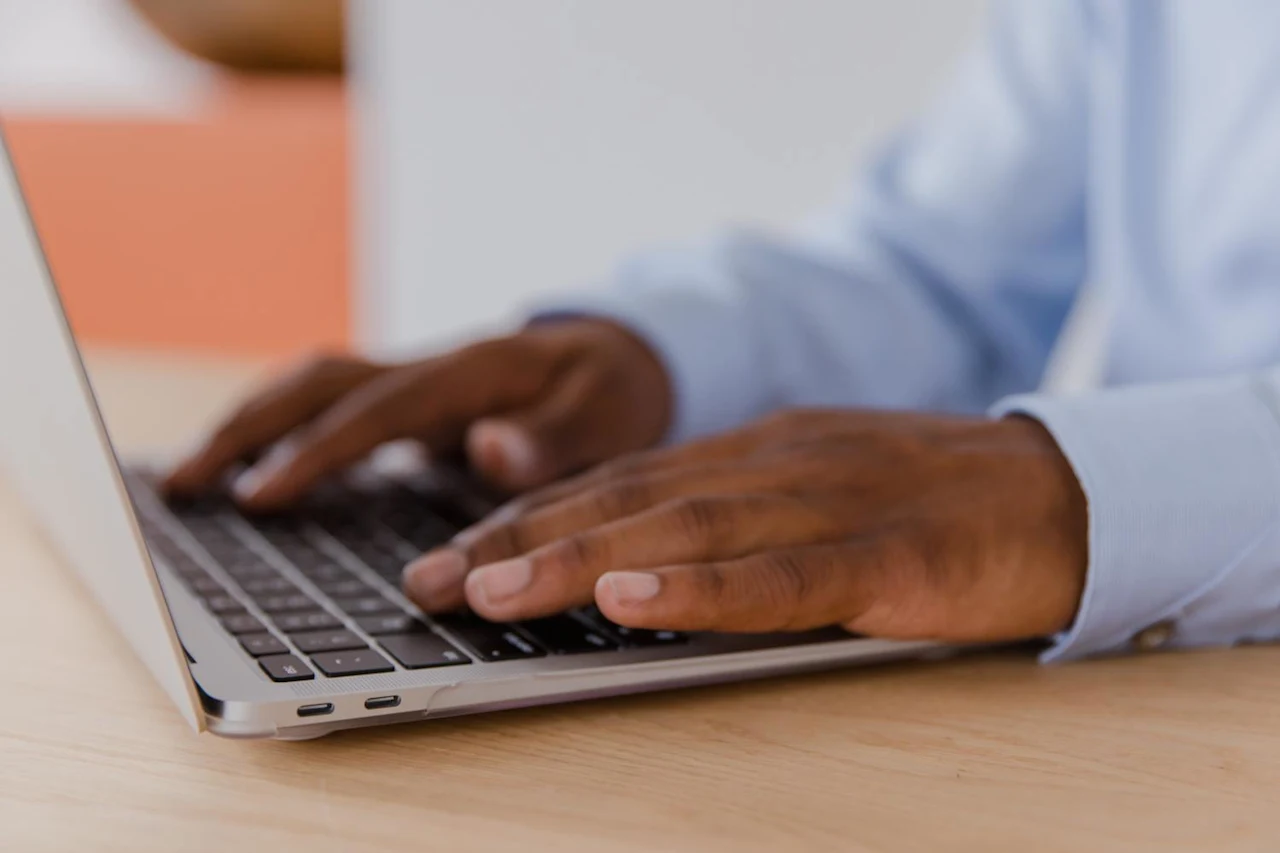 Man researching do I have to pay taxes on life insurance on laptop.