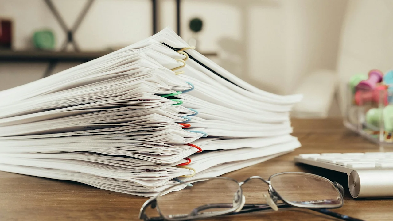 Stacks of paper on a desk