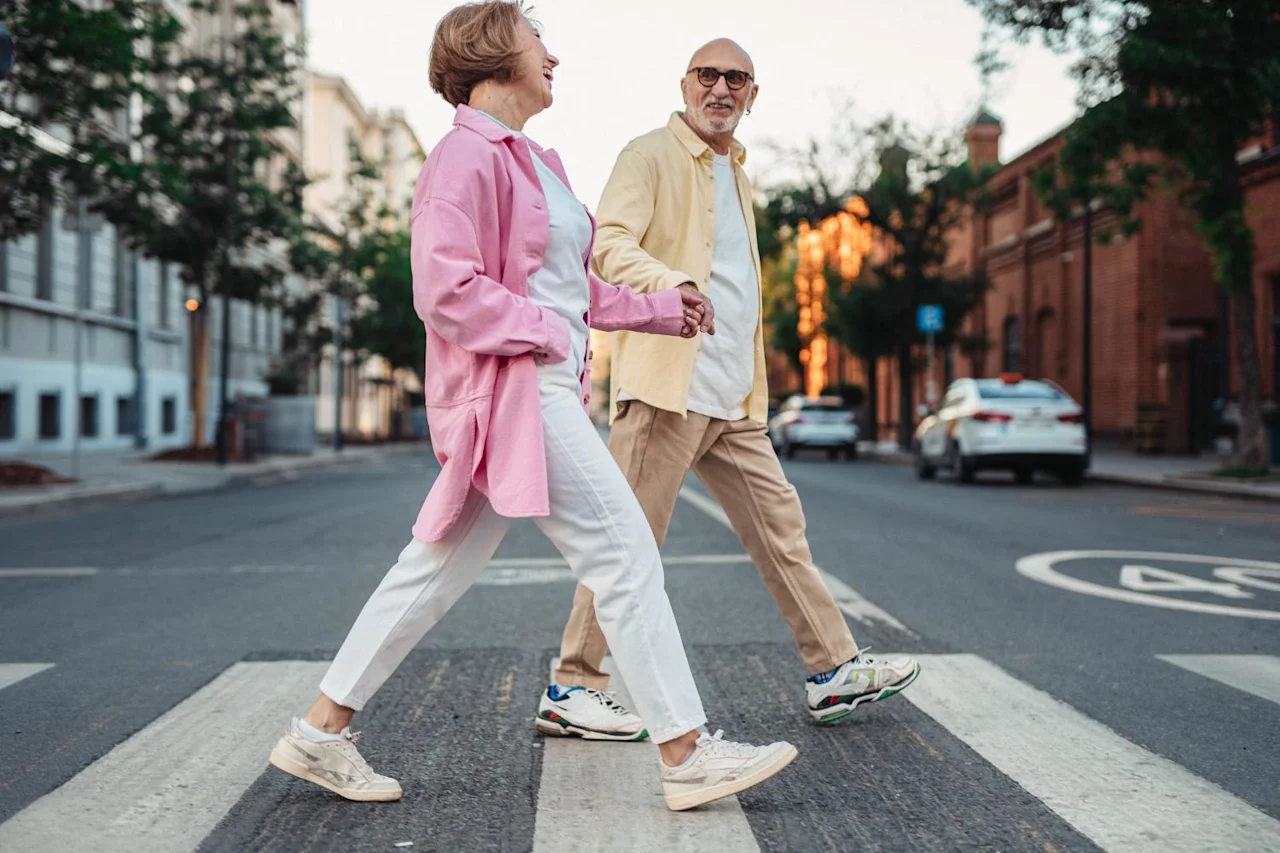Couple walking across the street talking about an Ethical Will.