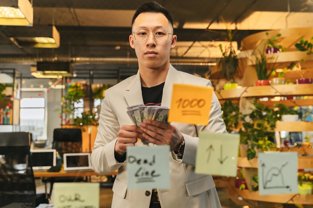 Colleague looking at the post-it note on the wall seeing if probate is required.