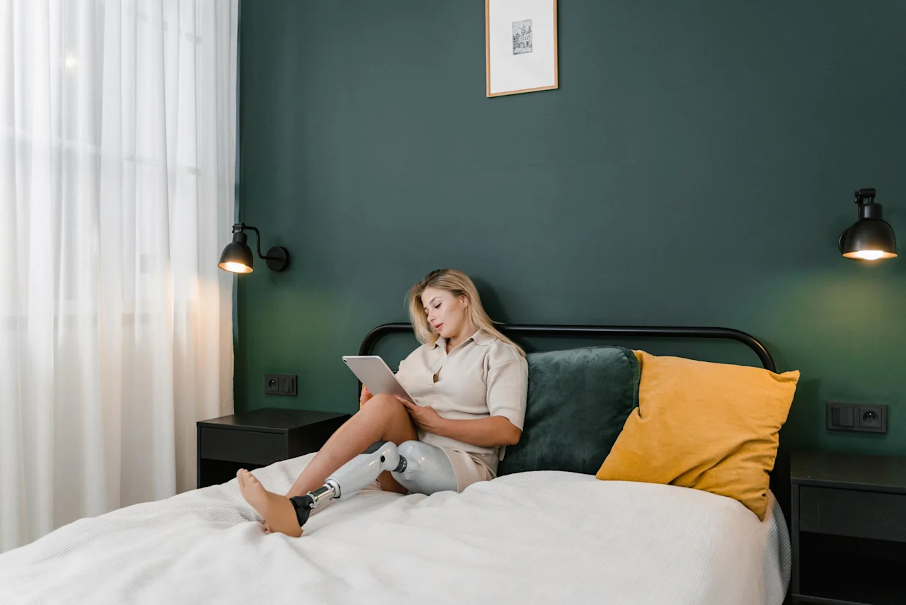Woman on laptop looking up recession estate and cryptocurrency planning tips.