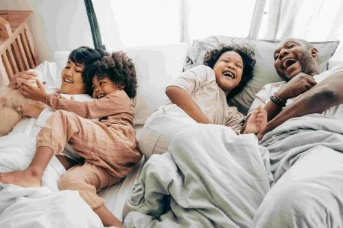 Family inheritance chat with parents while laying in bed.