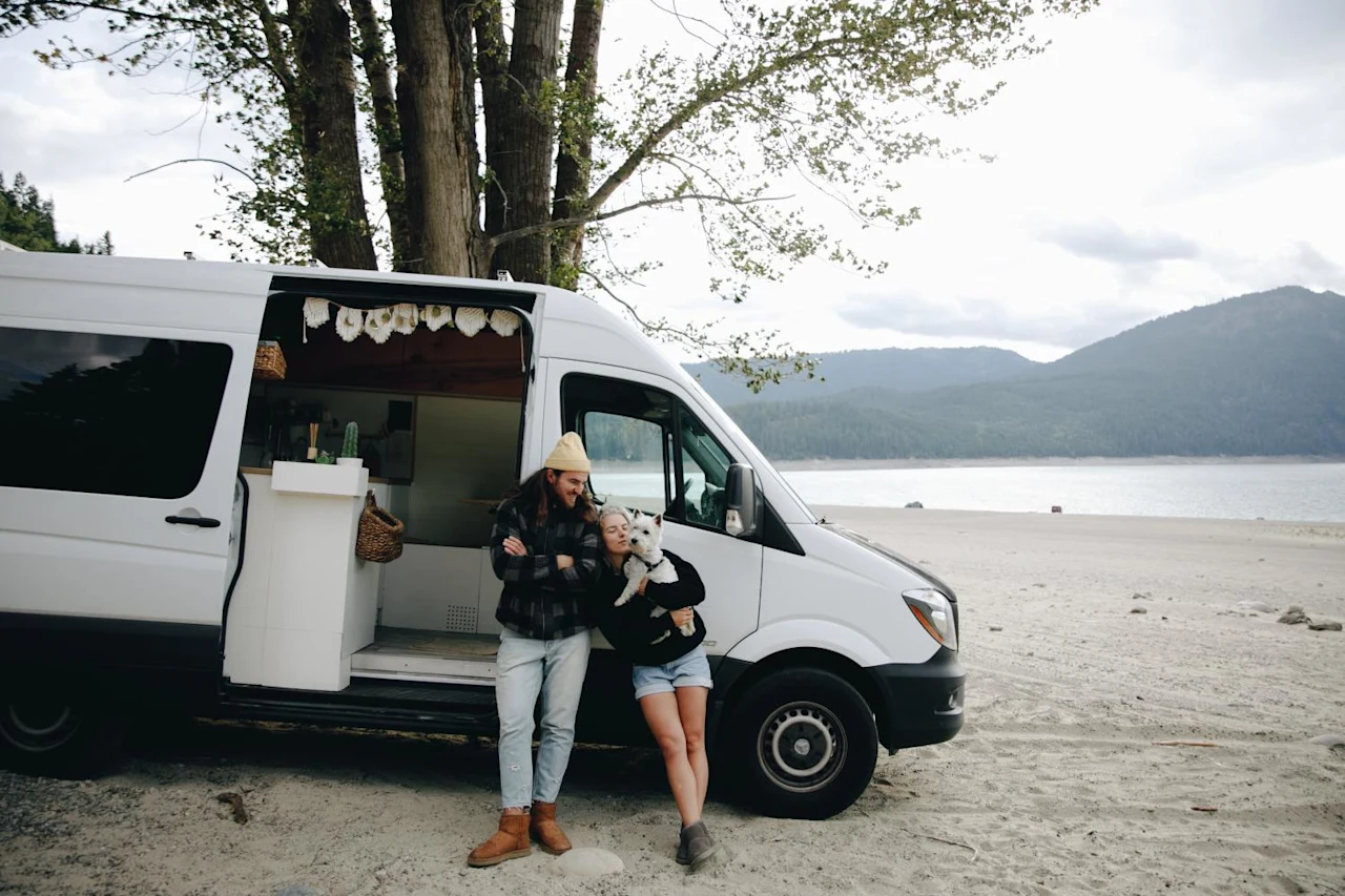 Couple enjoying van life after doing their research on remote digital nomads and estate and cryptocurrency planning.